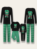 Pyjamas assortis pour la famille à carreaux classiques de Noël