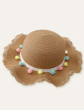 Chapéu de palha de férias com bola colorida